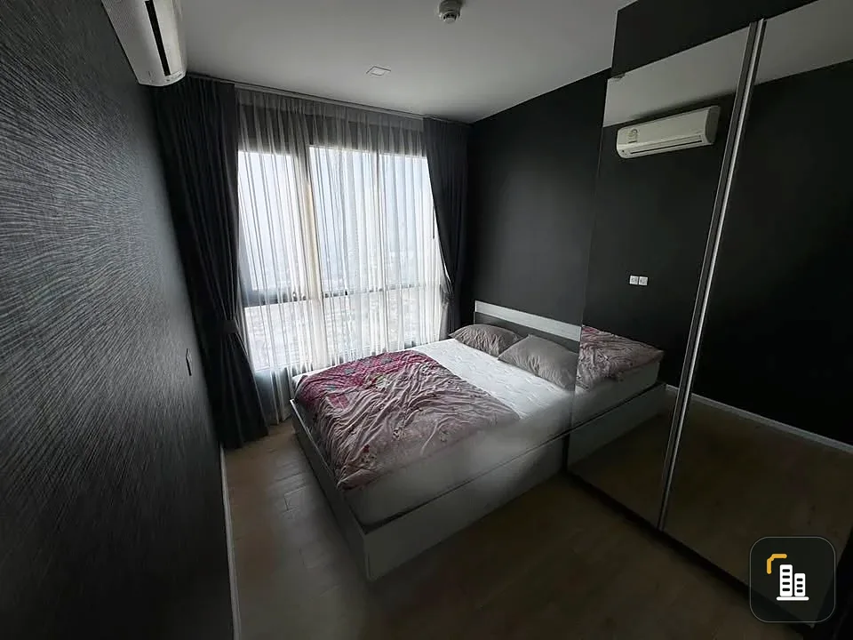 Selling a 1 Bed Plus corner unit in Notting Hill Leamchabang, located in the right building at the front of the condo, with a view of Kasetsart Univer