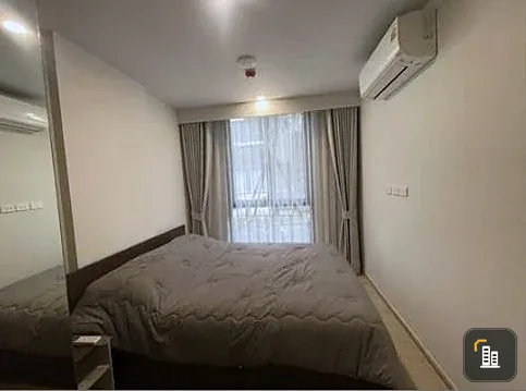 For rent: New Cross Khukot Station, 27 sq.m., 1st floor, Building C. There are trees behind the room, creating a very pleasant and shady atmosphere. T