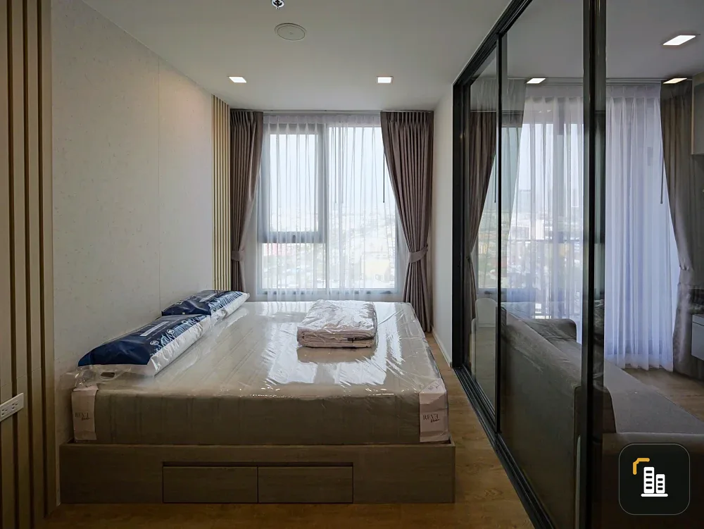 For rent: Modiz Rhyme Ramkhamhaeng. Beautiful room with a warm, homey atmosphere. The room features built-in furniture for practicality and a unique d