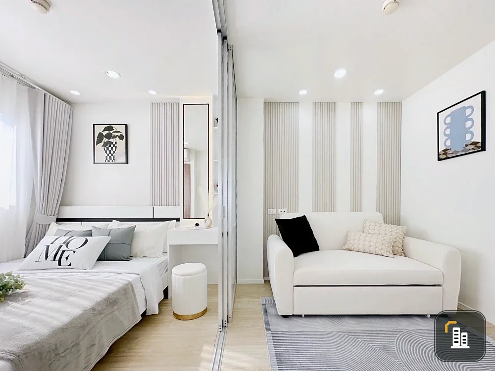 Selling Lumpini Condo Town Ramindra-Lat Pla Khao, 2nd floor unit. Beautifully decorated with a consistent color scheme and fully furnished. Book now!