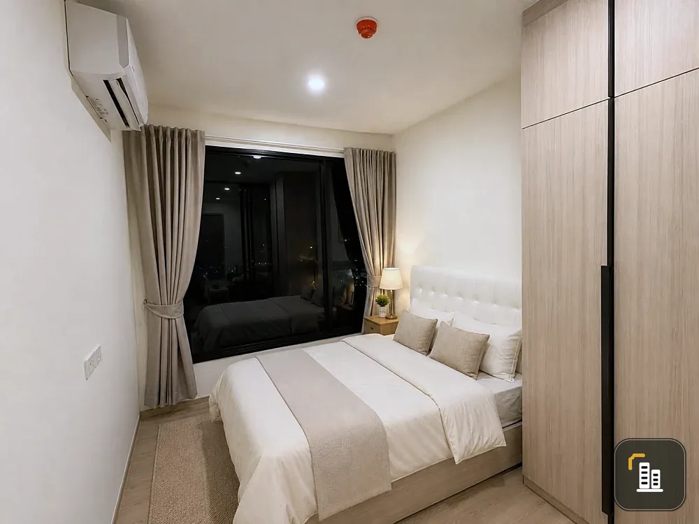 For rent: Origin Place Bangna, modern minimalist style unit with warm tones, fully furnished, separate kitchen. Don't miss out!