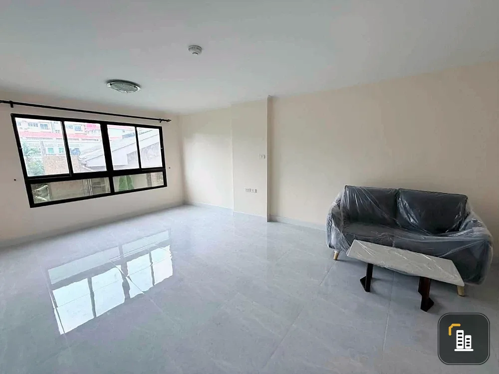 For sale: Lumpini Place Narathiwas 24. The unit is unfurnished except for one sofa. It's very clean, bright, and airy, allowing you to decorate it to