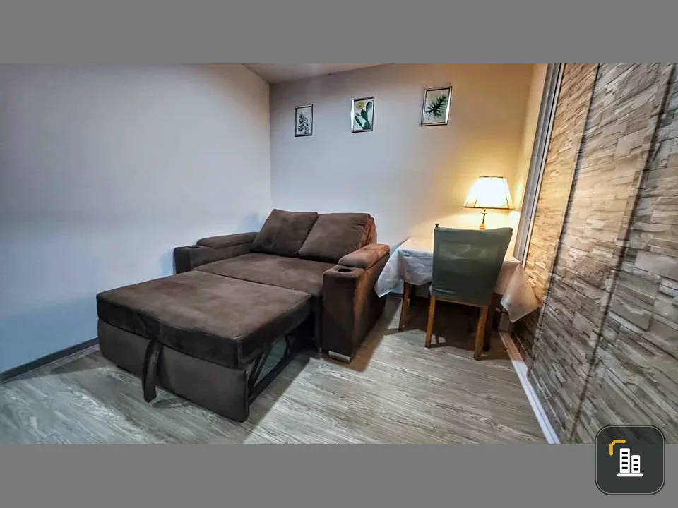 For sale: Regent Home Sukhumvit 97/1, corner unit. Facing the fire extinguisher storage room and fire escape, it's only adjacent to one other unit.