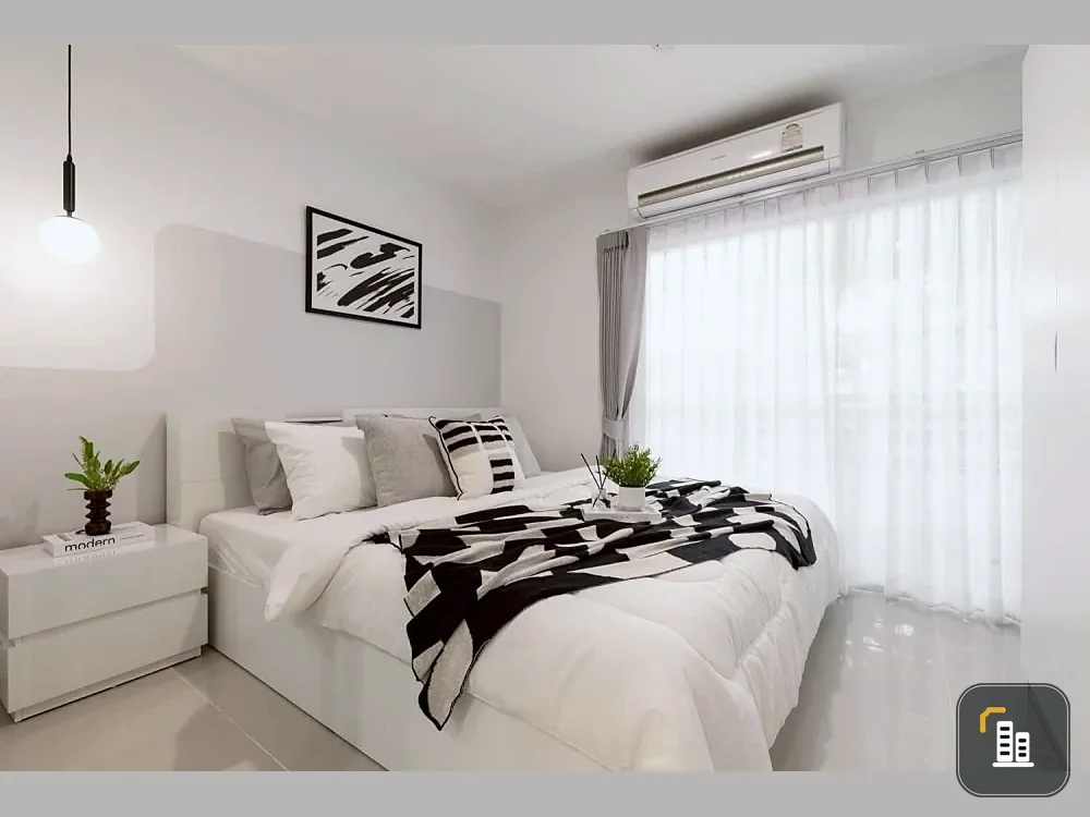 Selling a spacious unit at Metro Park Sathorn, 1st floor, Building G. The room is decorated in a stylish white and gray theme. Don't miss out!