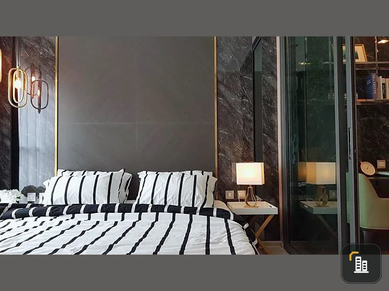 "OMG" but the room is so beautiful Marble wall alternates wallpaper. Looks great. Built-in furniture. This can't be missed.