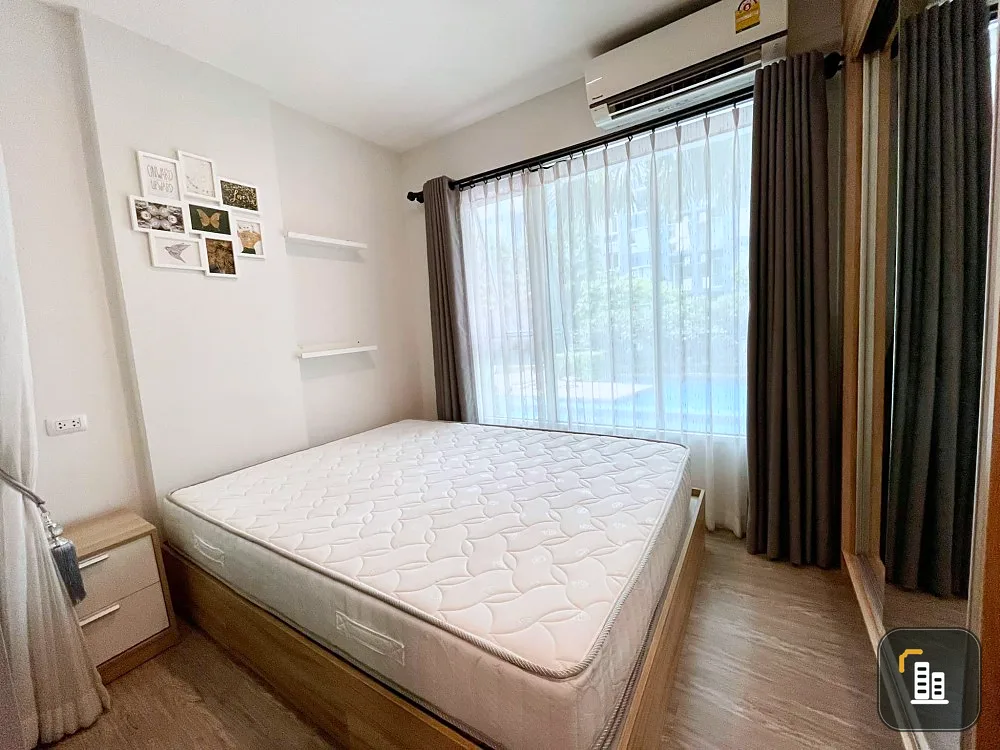 Sell Happy Condo Don Mueang, The Terminal, 2nd floor, pool view room with furniture and electrical appliances.