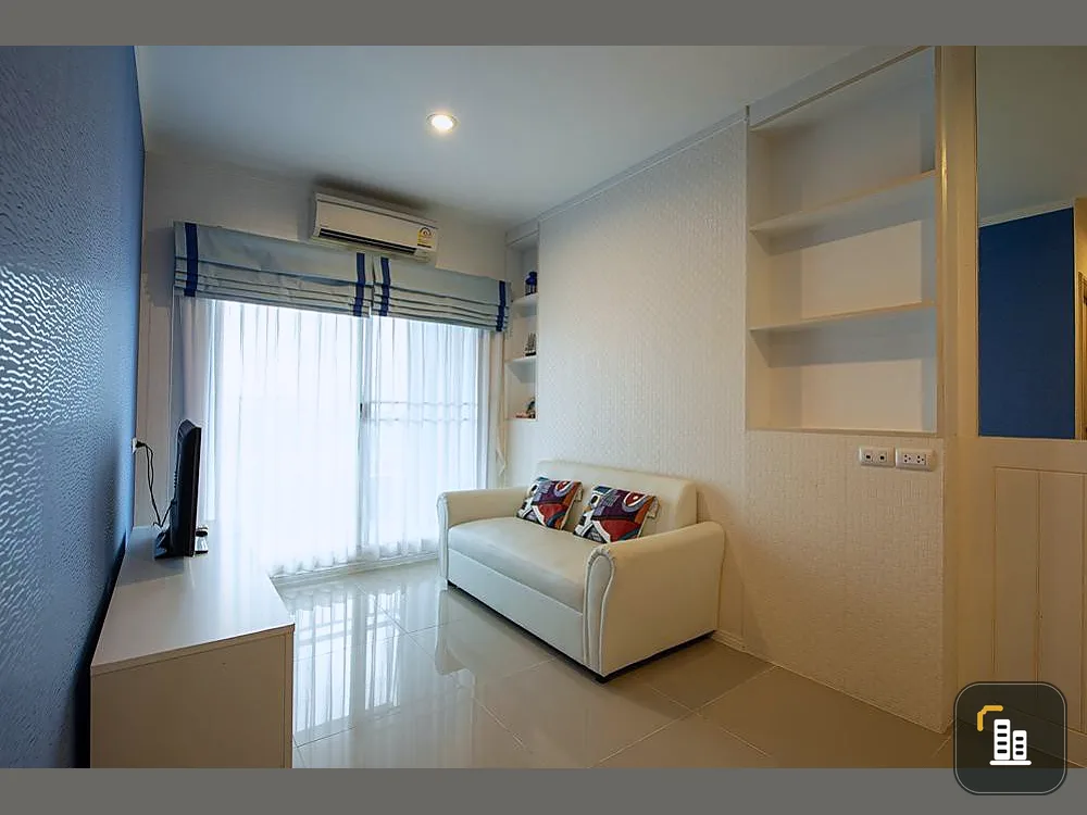 Condo for sale Lumpini Park Beach Jomtien is a building near the sea. sea view from bedroom have some fir