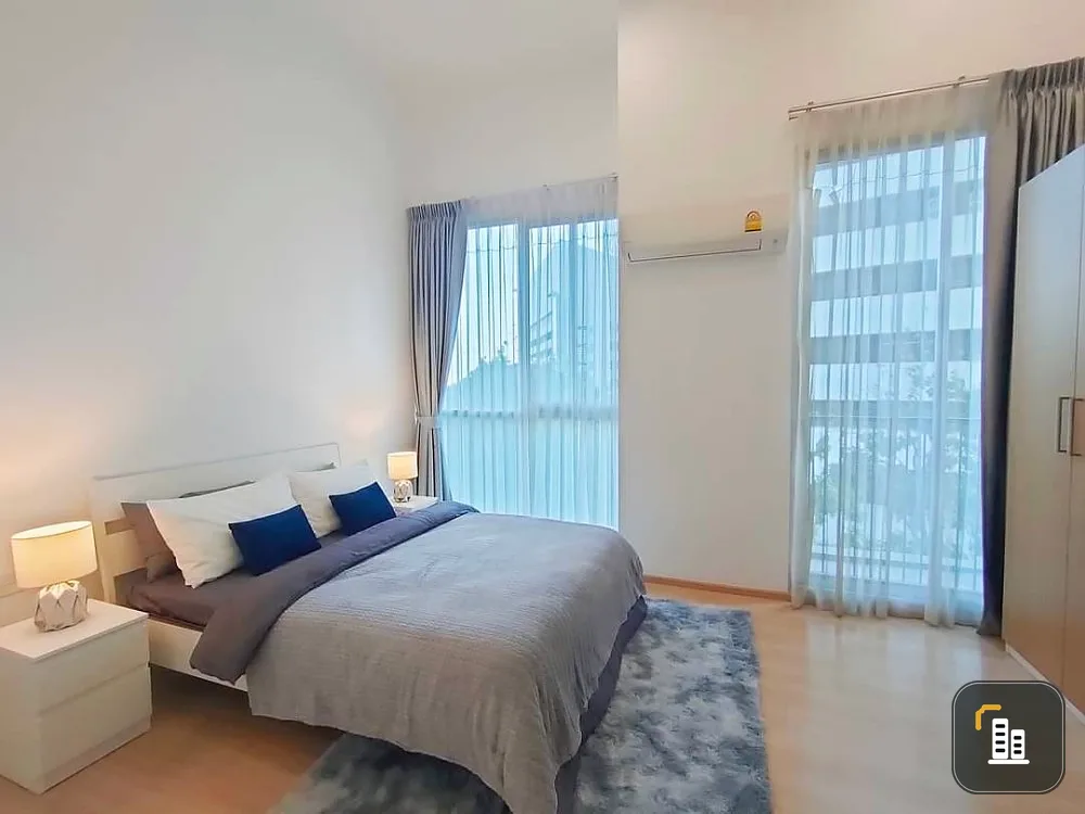 Condo for sale or rent: Noble Revolve Ratchada 2. The living room balcony is very wide next to the swimming pool.
