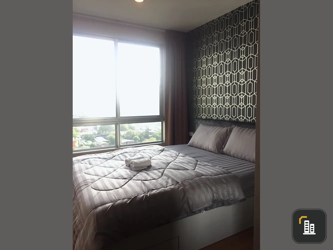 For sale: The Base Sukhumvit 77, swimming pool view. The bedroom has good wallpaper. Very good price. Definitely worth the price.