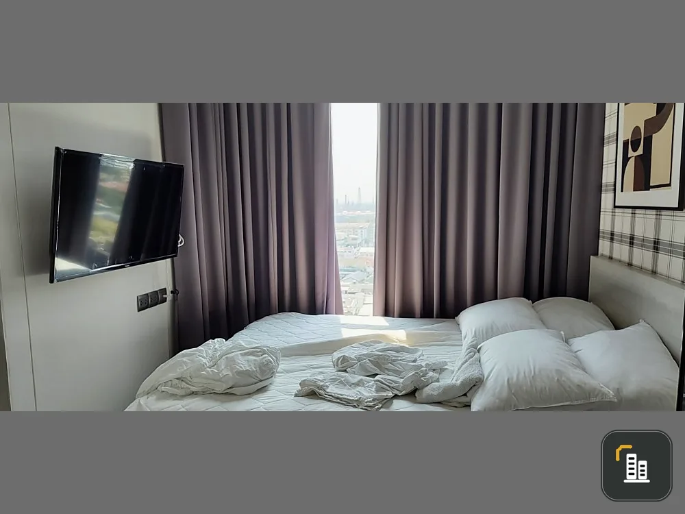 For sale: The Line Sukhumvit 101. The room is well proportioned, with built-ins and good wallpaper. Buy now.