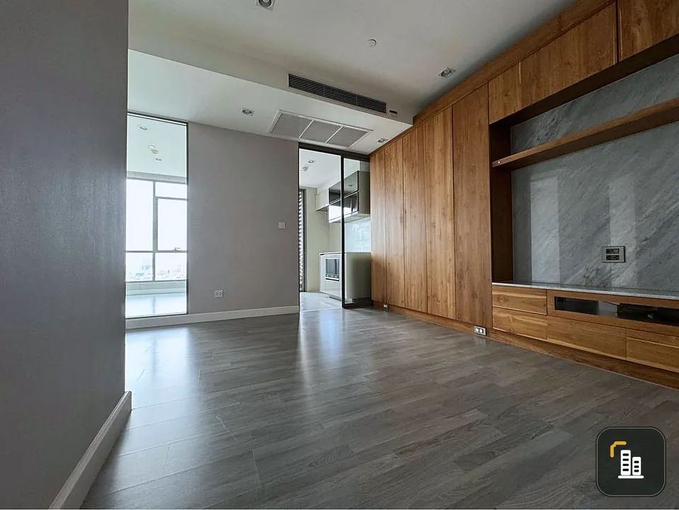 For sale: The Room Rama 4, with real teak cabinets fit-in throughout the living room wall, 15th floor, north direction, beautiful city view, urgent.