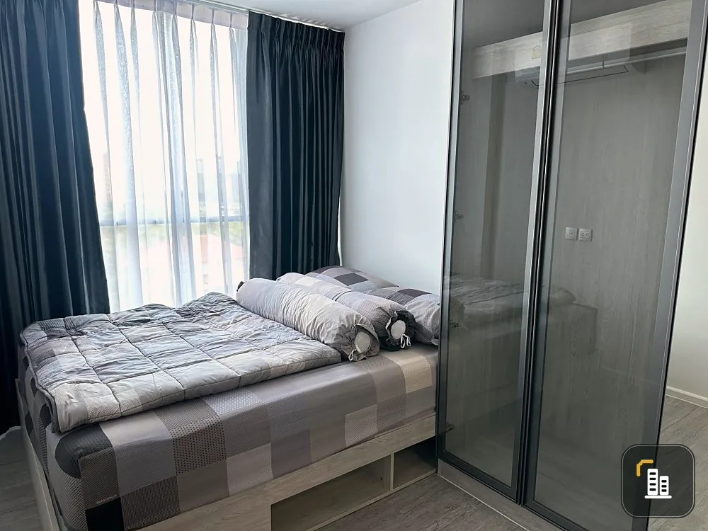 For rent: Atmoz Tropicana Bangna, resort-style condo, shady garden view, comfortable to the eye, fully furnished, hurry up and grab it.