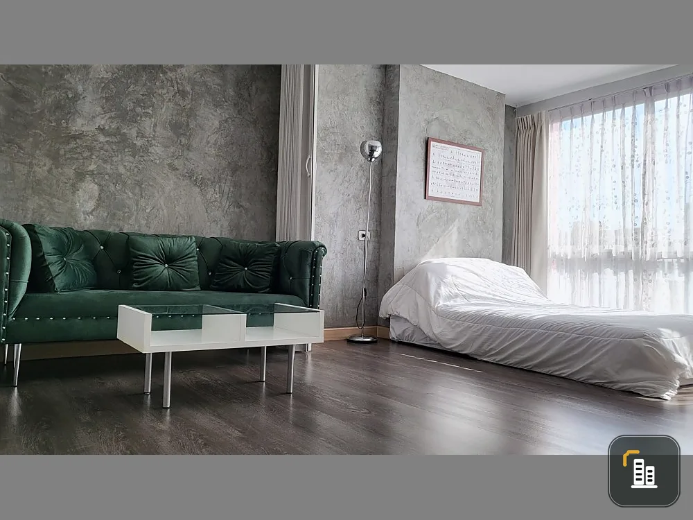 For sale Swift Condo ABAC Bangna, modern style room decorated in warm tones, suitable for relaxation, book now.