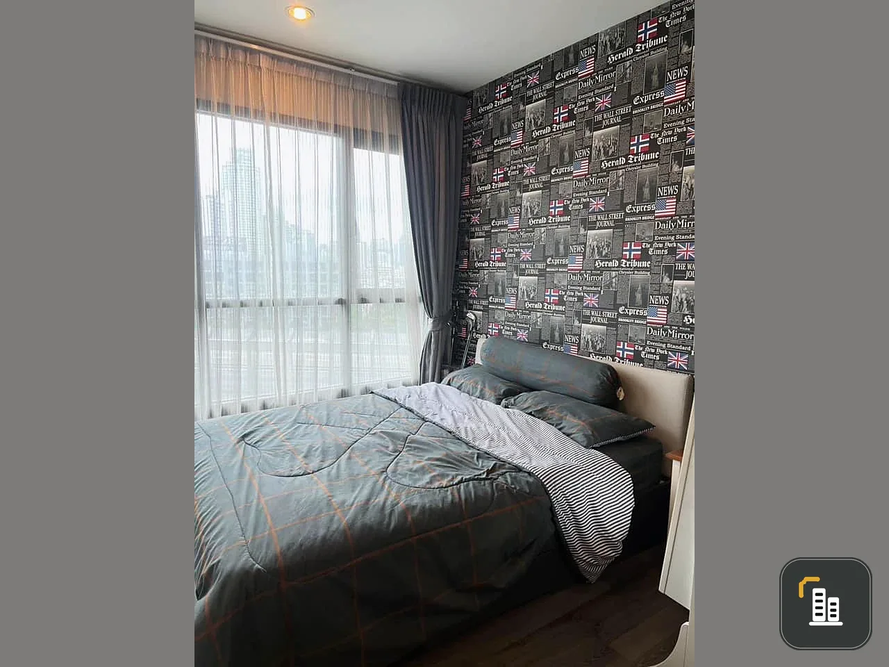 For sale: The Base Park West, 7th floor, expressway side, with wallpaper in a chic pattern throughout the room, complete with furniture. You will regr