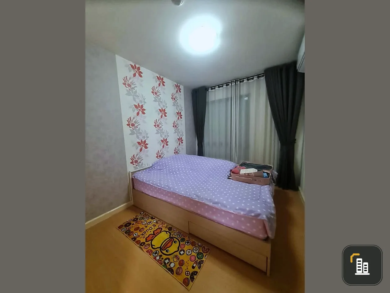 For sale: I-Condo Sukhapiban 2, with wallpaper in a very cool pattern throughout the room. The room is on the 2nd floor, next to the fire exit, defini