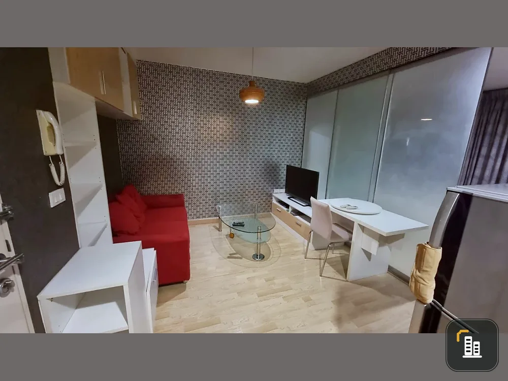 For sale: The IRIS Rama 9-Srinakarin, fully wallpapered throughout the room, fully furnished, ready to move in.