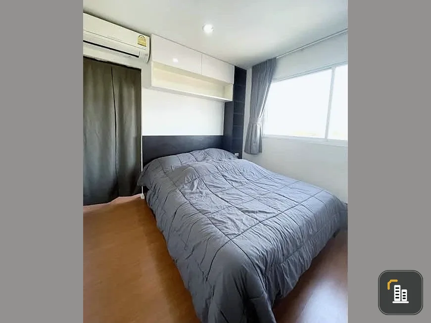 For sale: Lumpini Condo Town Ramintra-Lat Phrao 2, large room, 2 bedrooms, 2 bathrooms, city view, cool breeze, with built-in furniture, very worth bo