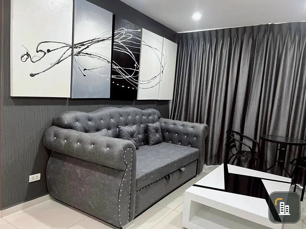 For rent: The Vision, a comfortable room with a large sofa for sitting and a sea view. If it's this good, what are you waiting for?