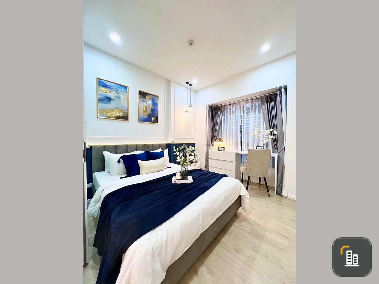 For sale or rent: S1 Rama 9 unit. The room stays cool and comfortable as it doesn't get direct sunlight. Stylish and well-decorated, it meets all your